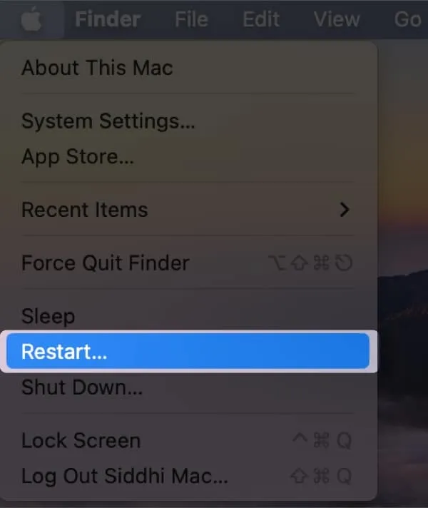 Basta clicar no logotipo da Apple → escolher Reiniciar no seu Mac