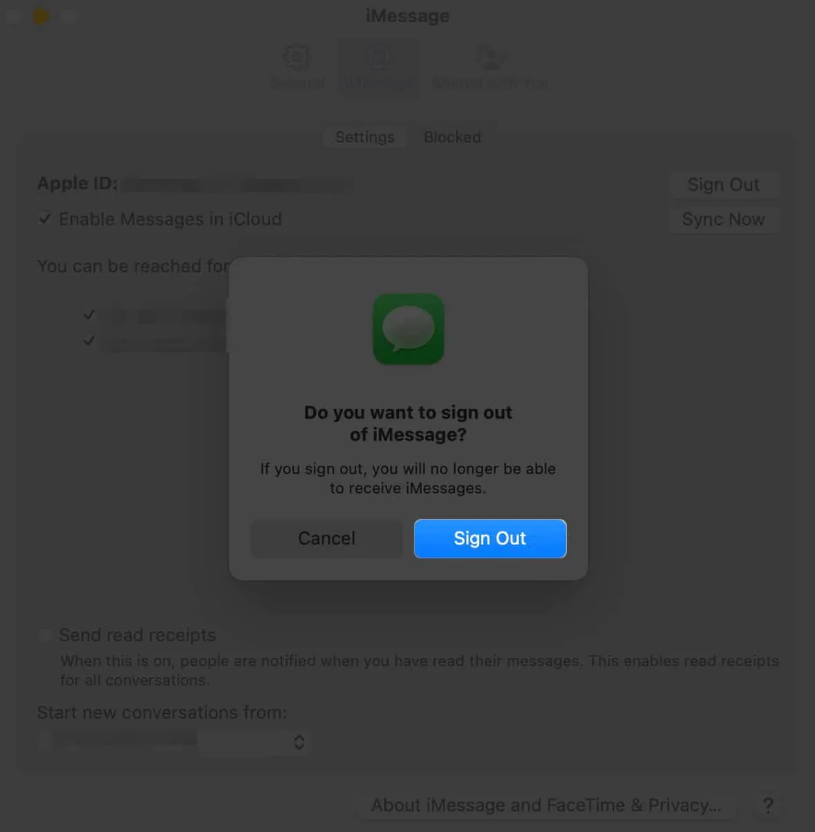按您的 Apple ID 旁邊的“退出”。